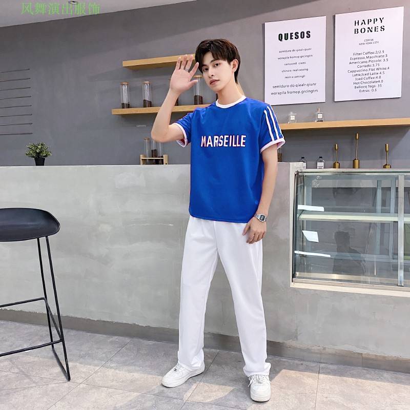 Blue shirt + white pants